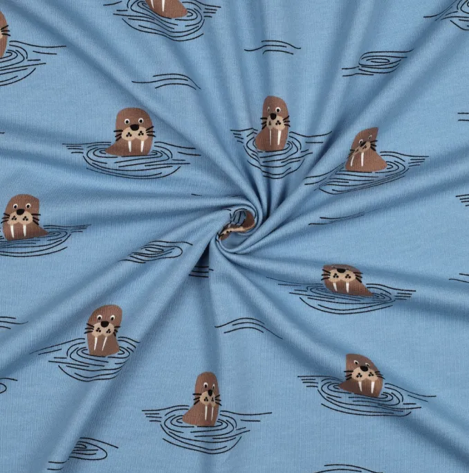 Sweaterstof blauw met walrussen